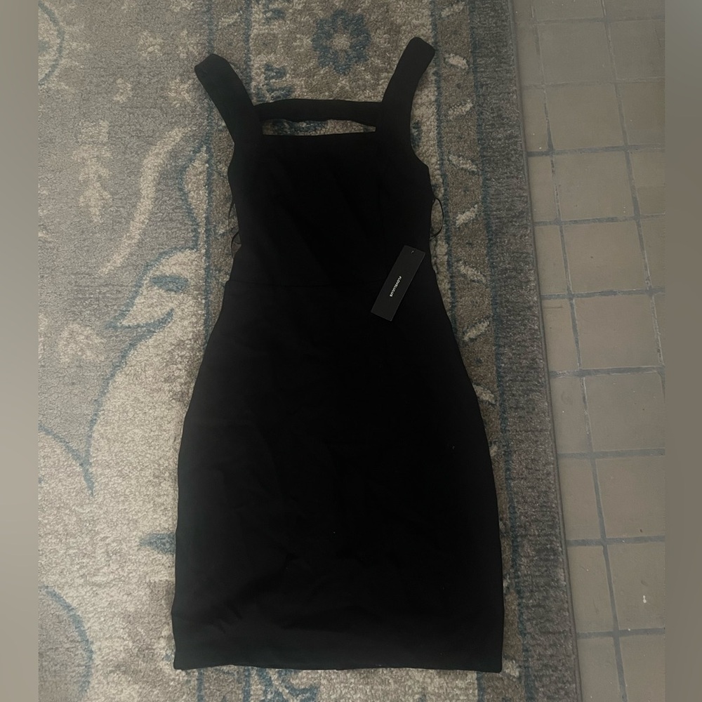 Lulu’s black bodycon dress . NWT . SIZE XS